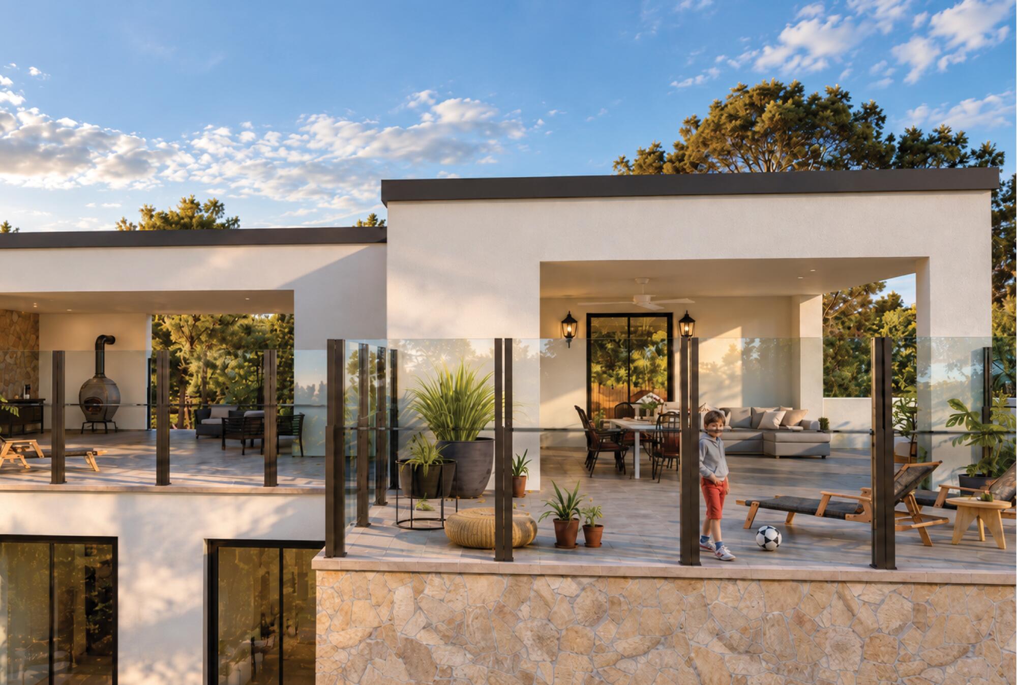 Villa terrace with glass windbreak